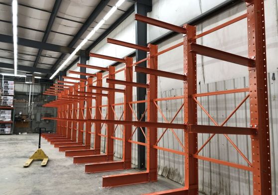 Cantilever racks storing long pipes and steel materials