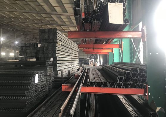 Cantilever racks storing long pipes and steel materials