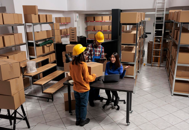 Warehouse Management Team Collaborating in an Industrial Setting
