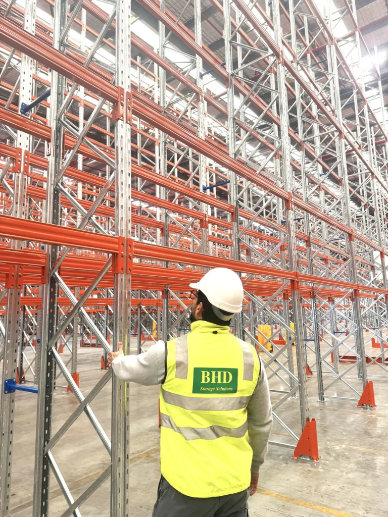 BHD Engineer Inspecting High-Rise Warehouse Racking Installation