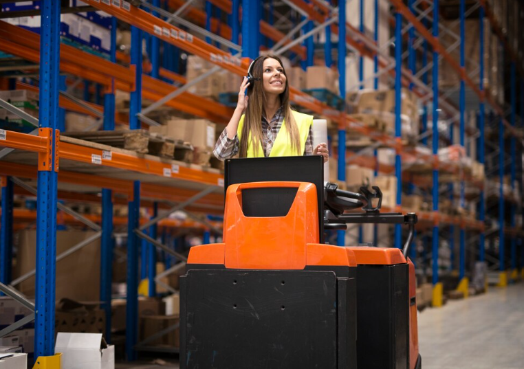 Warehouse Management: Efficiency and Safety (Woman operating material handling equipment)